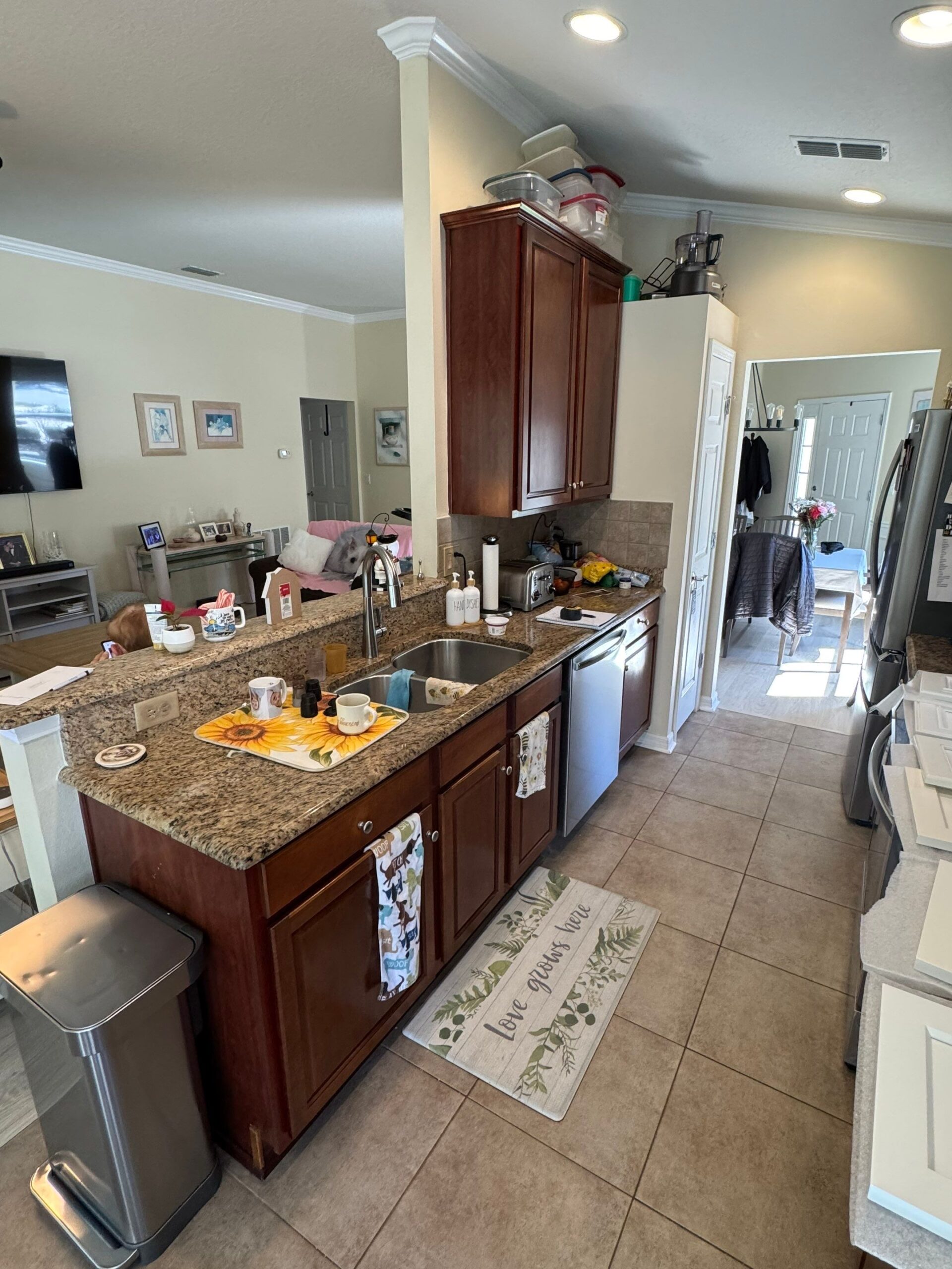 Custom built-in cabinetry with wood shelves and drawers in a modern interior, cabinet work for contractors Jacksonville