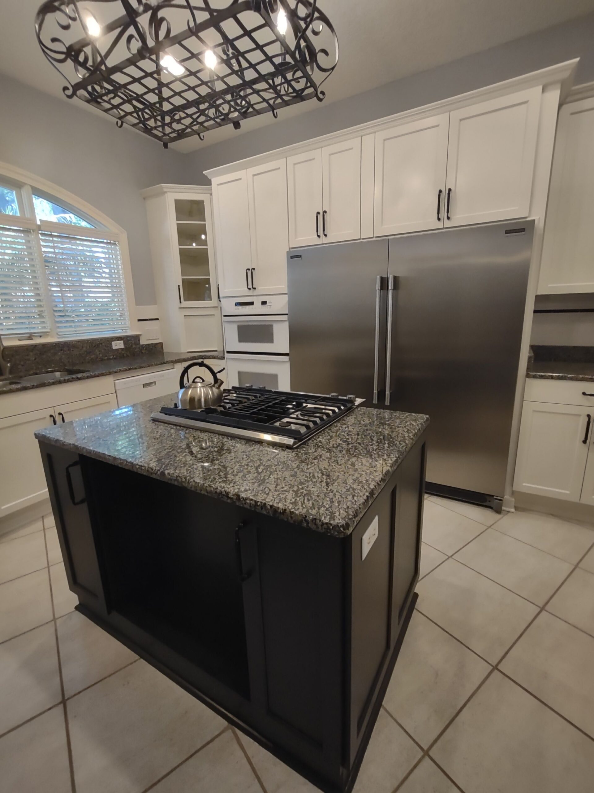 Custom kitchen cabinetry with wood cabinets and countertop, showcasing custom cabinets Jacksonville craftsmanship